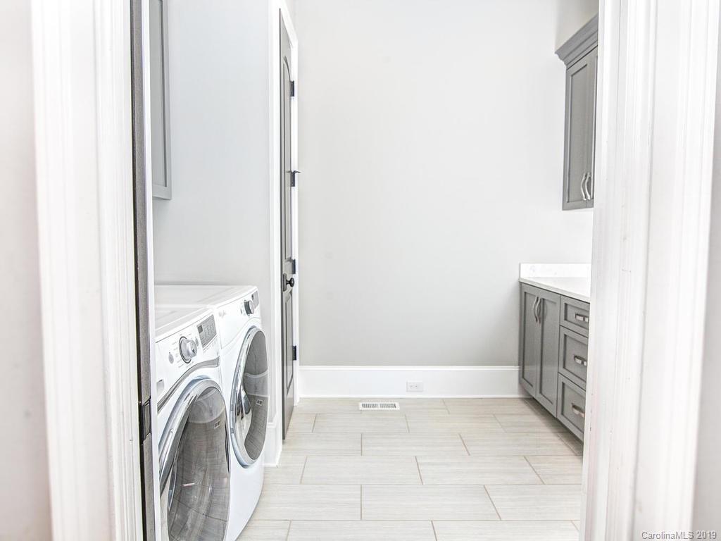 6237 Sharon Acres Road Charlotte, NC 28210 - Photo 38 of 48 a view of walk in closet with washer and dryer