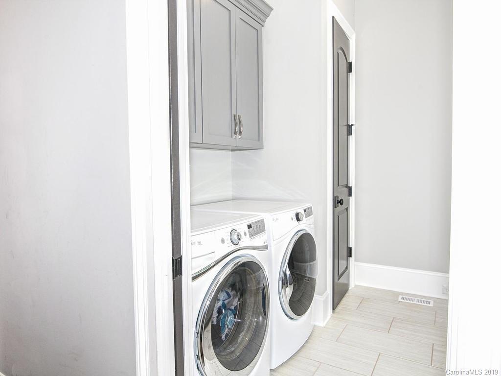 6237 Sharon Acres Road Charlotte, NC 28210 - Photo 39 of 48 a utility room with dryer and washer