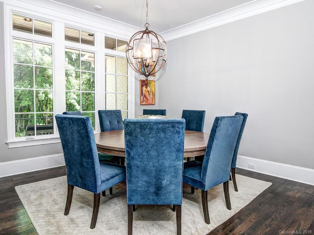 6237 Sharon Acres Road Charlotte, NC 28210 - Photo 5 of 48 a view of a dining room with furniture window and wooden floor
