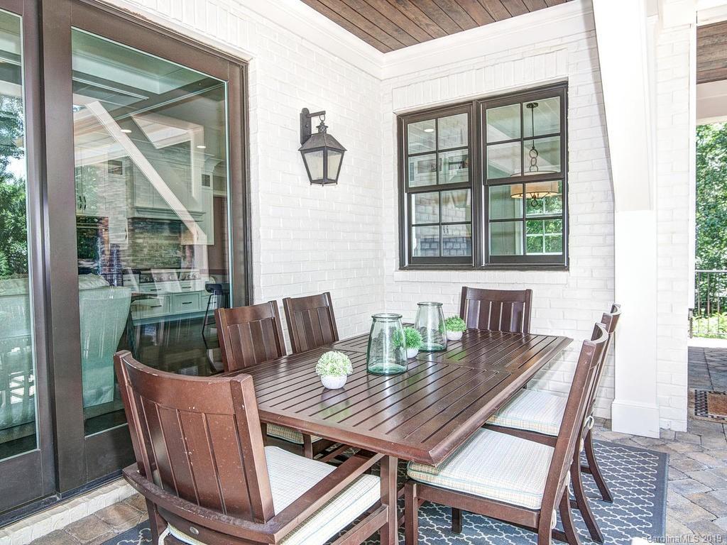 6237 Sharon Acres Road Charlotte, NC 28210 - Photo 43 of 48 a view of a dining room with furniture window and outside view