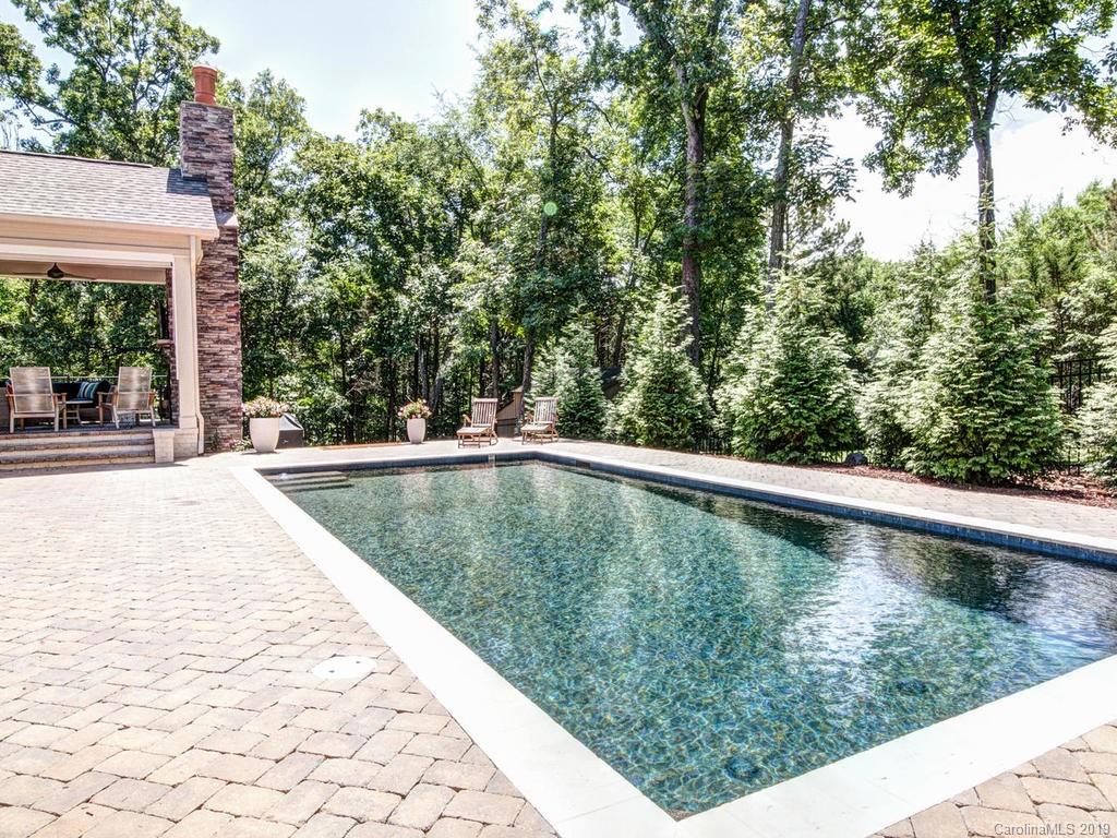 6237 Sharon Acres Road Charlotte, NC 28210 - Photo 44 of 48 a view of a swimming pool with a yard
