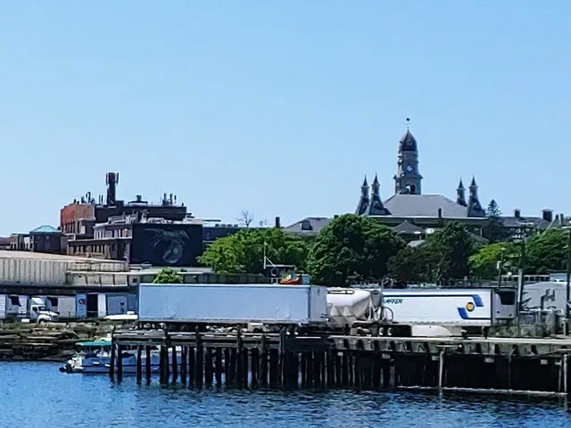 a view of a balcony with chairs
