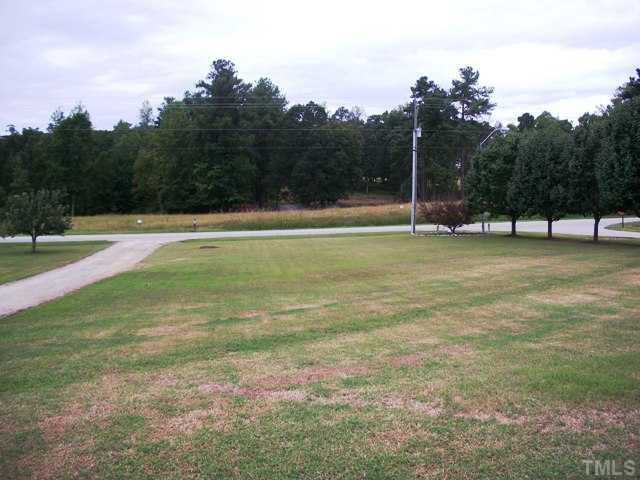 8131 Covered Bridge Road Wendell, NC 27591 - Photo 3 of 22 The view from the front porch and Covered Bridge Rd. Not in the middle of a subdivision! Across the street is a pond. Exterior Front