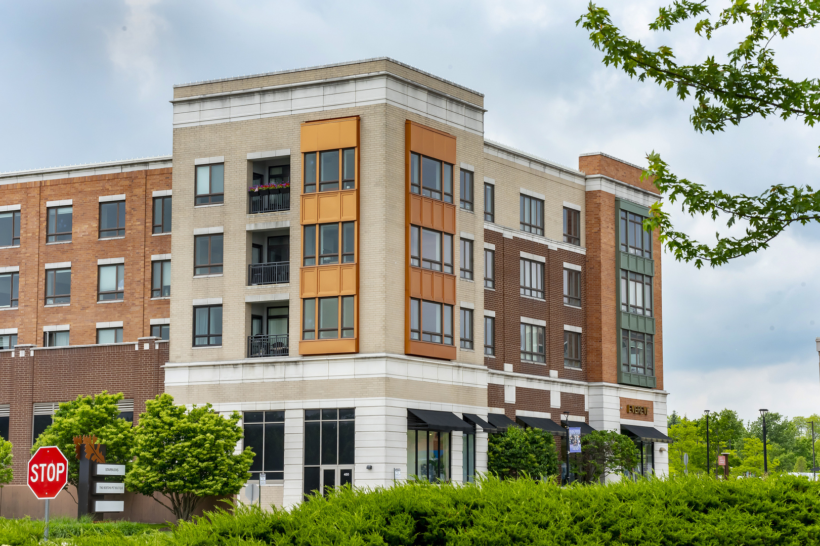450 Village Center Drive, Unit 315 Burr Ridge, IL 60527 - Photo 1 of 21 a front view of a building