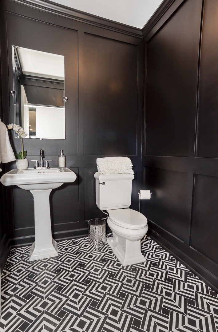 450 Village Center Drive, Unit 315 Burr Ridge, IL 60527 - Photo 11 of 21 a bathroom with a sink toilet and shower