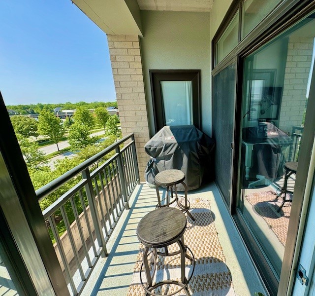 450 Village Center Drive, Unit 315 Burr Ridge, IL 60527 - Photo 12 of 21 a view of balcony and patio