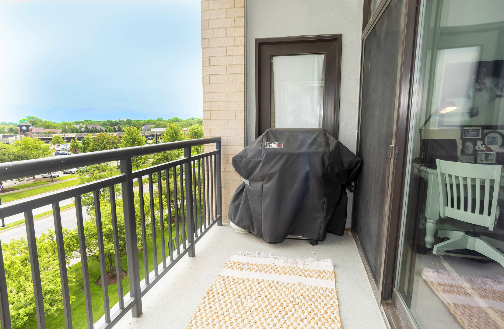 450 Village Center Drive, Unit 315 Burr Ridge, IL 60527 - Photo 13 of 21 a view of a balcony