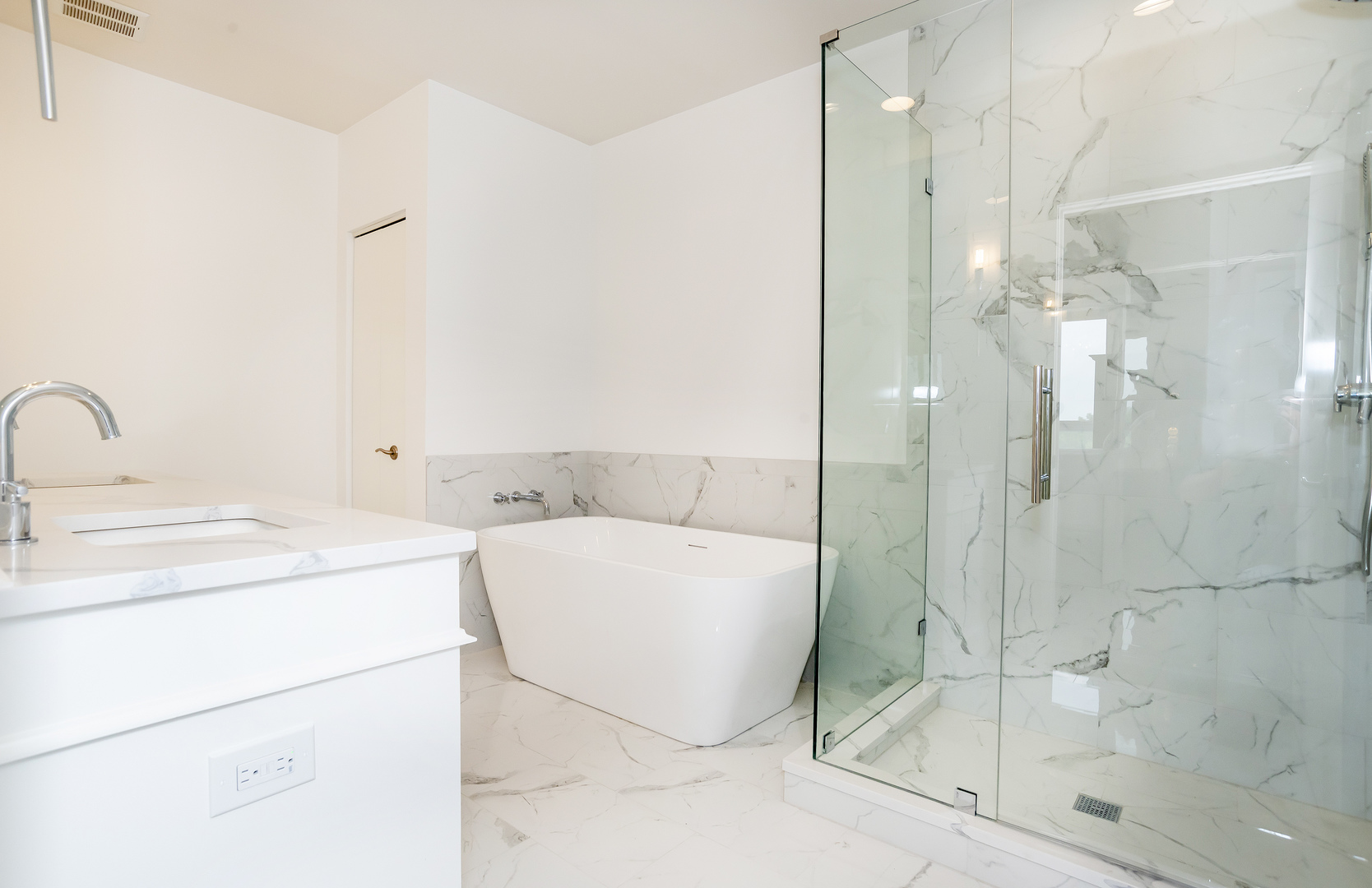 450 Village Center Drive, Unit 315 Burr Ridge, IL 60527 - Photo 15 of 21 a bathroom with a tub sink and shower