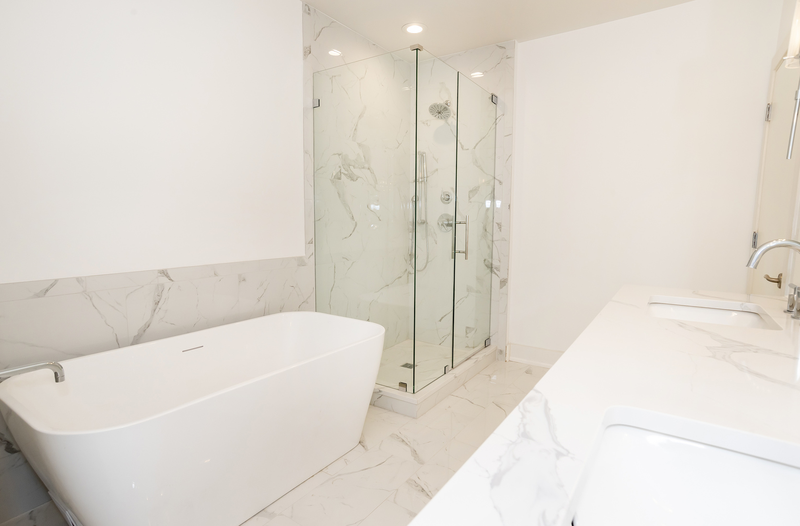 450 Village Center Drive, Unit 315 Burr Ridge, IL 60527 - Photo 17 of 21 a bathroom with a bathtub and shower