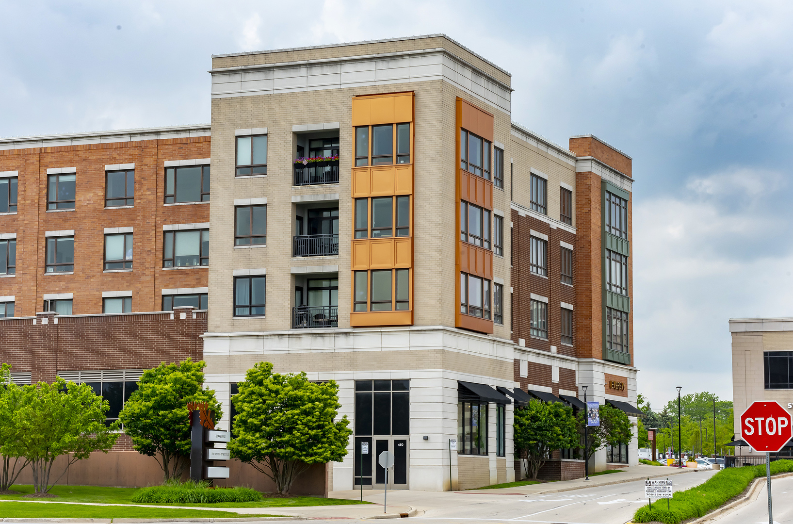 450 Village Center Drive, Unit 315 Burr Ridge, IL 60527 - Photo 20 of 21 a front view of a building