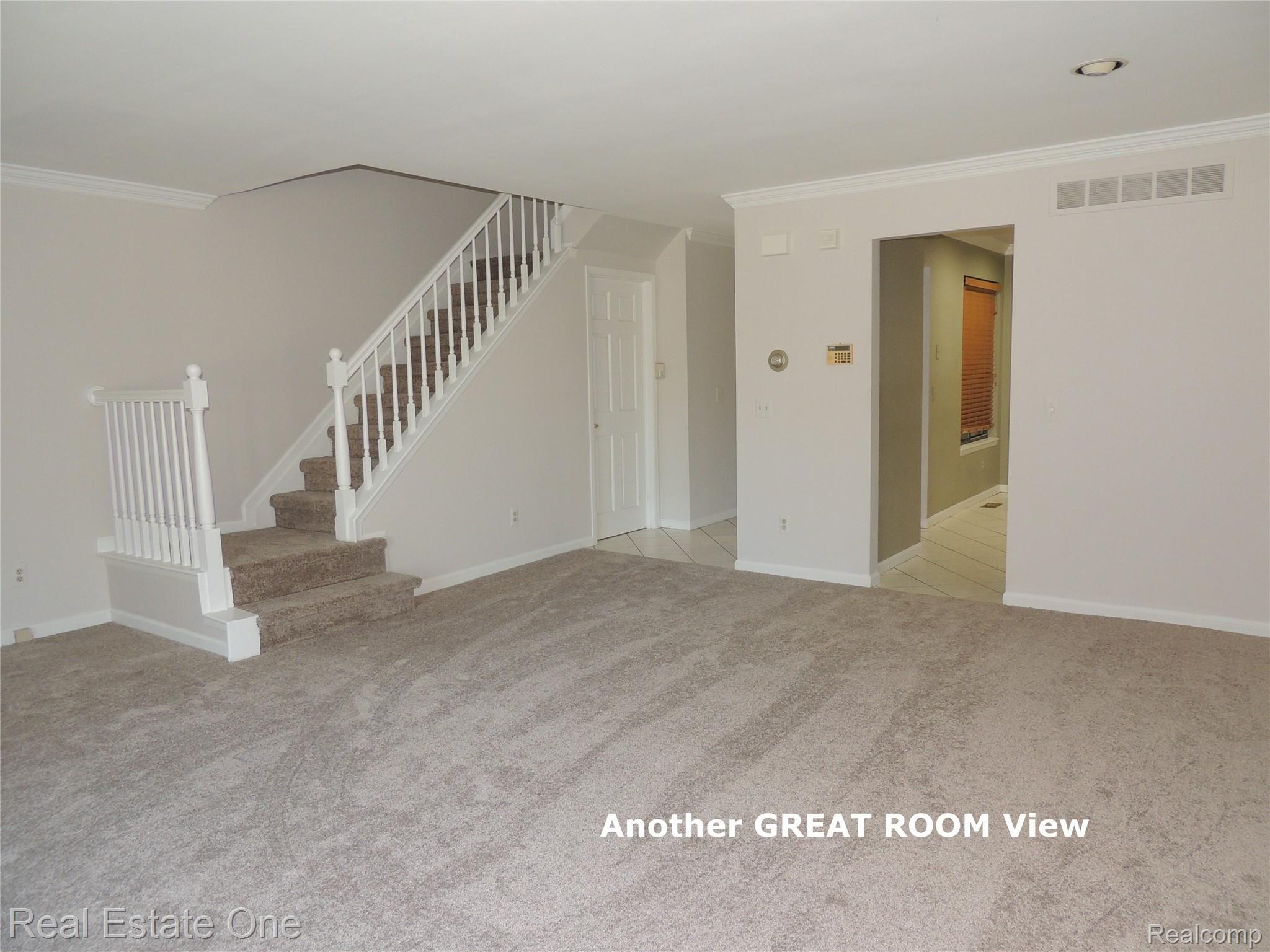 678 Tennyson, Unit 12 Rochester, MI 48307 - Photo 6 of 25 Another Great Room View.JPG
