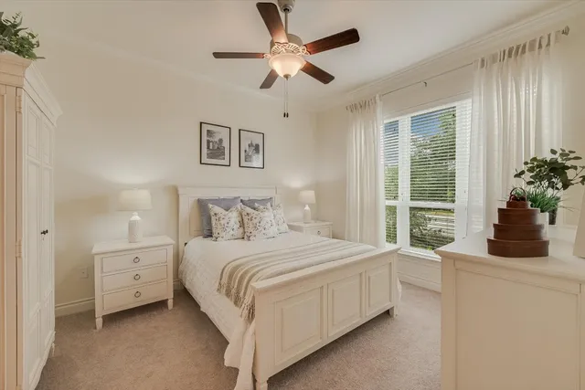 a living room with fireplace furniture and a wooden floor