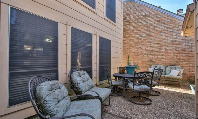 a building outdoor space with patio furniture