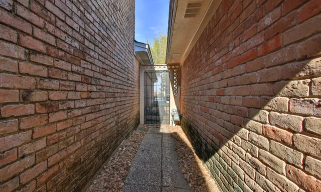 a pathway between two buildings