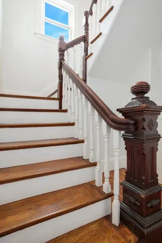 a view of entryway with wooden floor