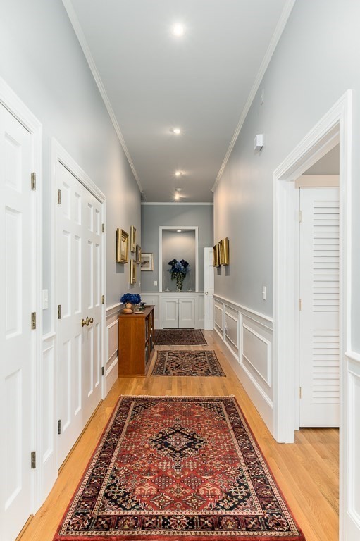 11 Thissell Street, Unit 3 Beverly, MA 01915 - Photo 12 of 31 a view of gallery with wooden floor