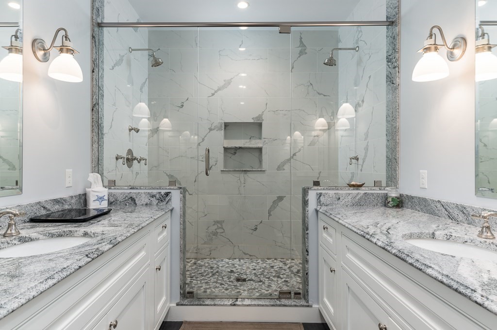 11 Thissell Street, Unit 3 Beverly, MA 01915 - Photo 18 of 31 a bathroom with a granite countertop shower sink vanity and mirror
