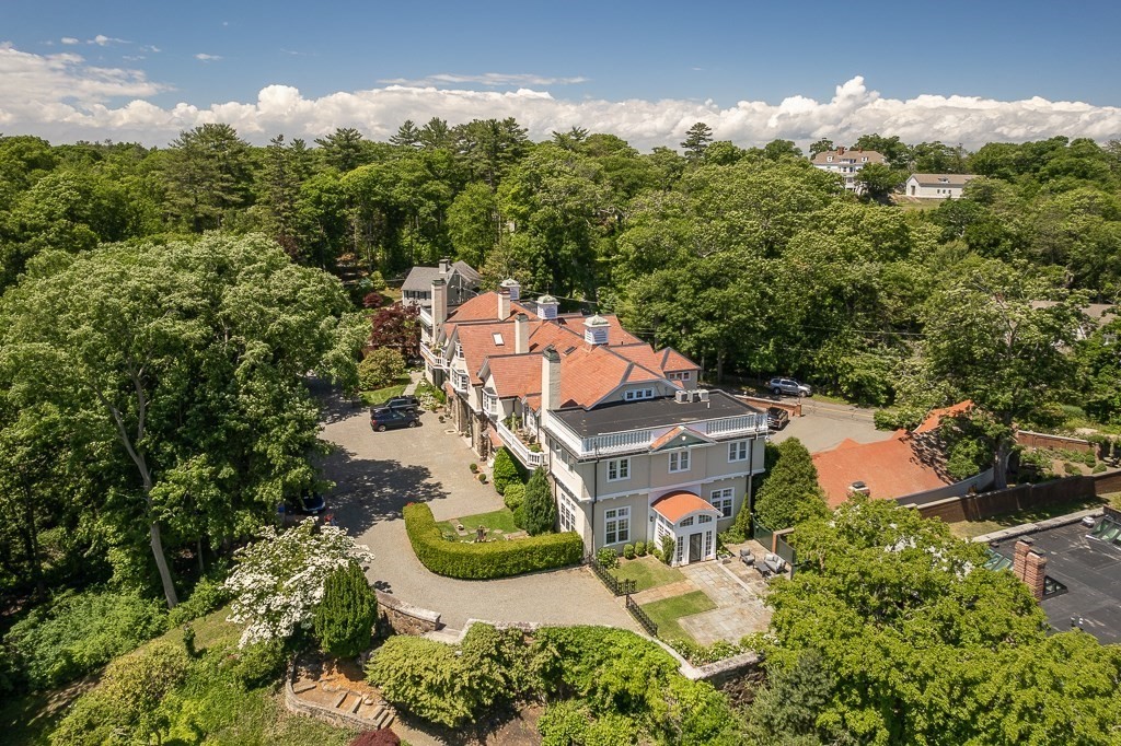 11 Thissell Street, Unit 3 Beverly, MA 01915 - Photo 20 of 31 an aerial view of a house with a yard and lake view