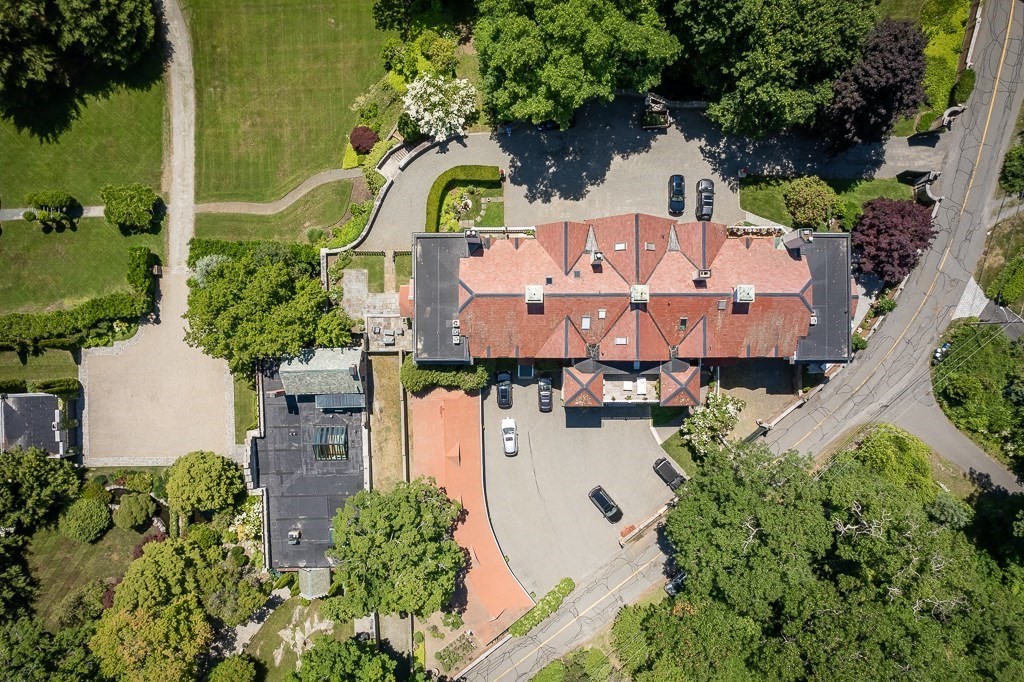 11 Thissell Street, Unit 3 Beverly, MA 01915 - Photo 22 of 31 an aerial view of a house with a yard swimming pool and outdoor seating