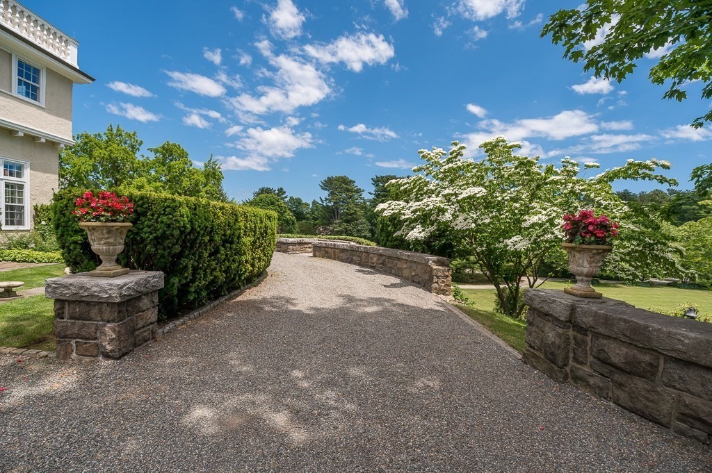 11 Thissell Street, Unit 3 Beverly, MA 01915 - Photo 26 of 31 a view of a backyard with garden