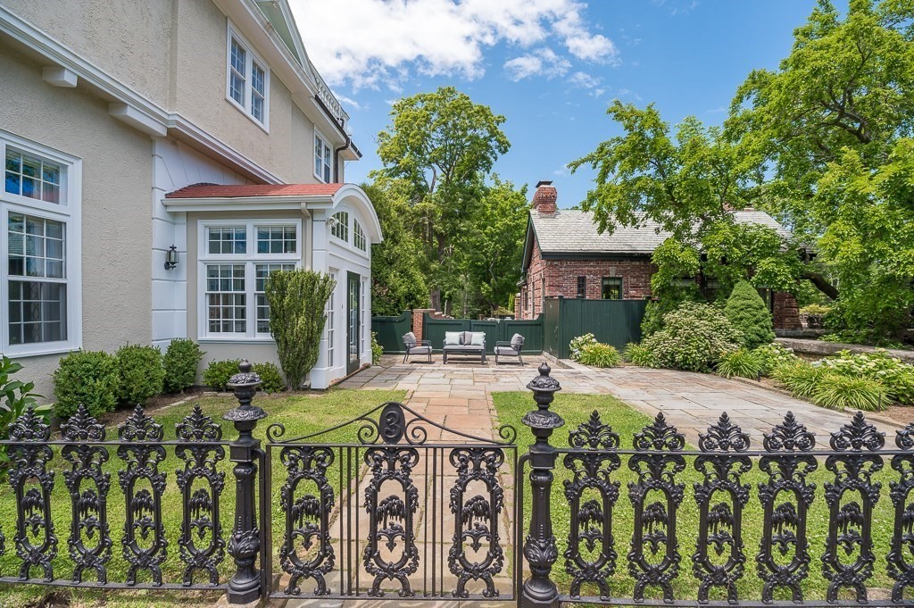 11 Thissell Street, Unit 3 Beverly, MA 01915 - Photo 28 of 31 a view of an house with backyard and sitting area