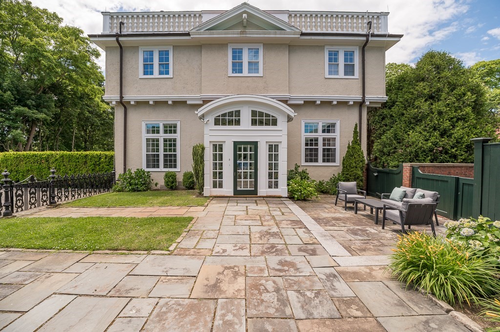 11 Thissell Street, Unit 3 Beverly, MA 01915 - Photo 29 of 31 a front view of a house with garden
