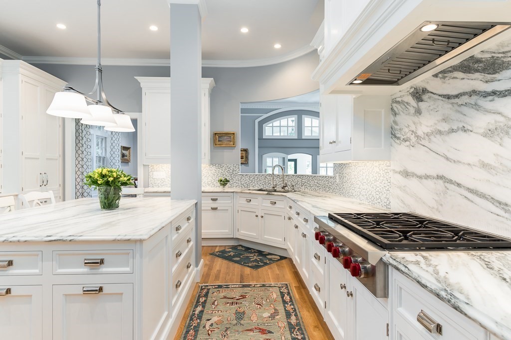 11 Thissell Street, Unit 3 Beverly, MA 01915 - Photo 6 of 31 a kitchen with granite countertop a sink stove and cabinets