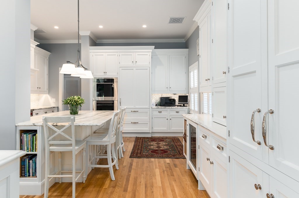 11 Thissell Street, Unit 3 Beverly, MA 01915 - Photo 8 of 31 a large kitchen with cabinets