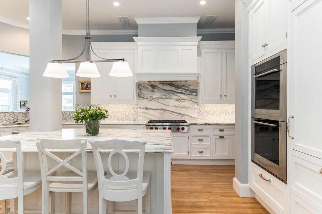 11 Thissell Street, Unit 3 Beverly, MA 01915 - Photo 9 of 31 a kitchen with a stove cabinets and counter space