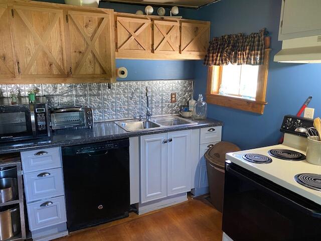 1395 Colonial Road Blue Ridge, VA 24064 - Photo 2 of 7 a kitchen with a sink stove and cabinets