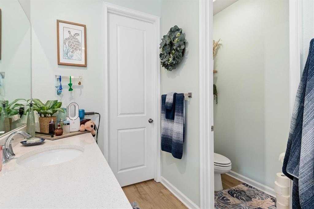11819 Sistine Lane Venice, FL 34293 - Photo 24 of 90 a bathroom with a toilet and a shower