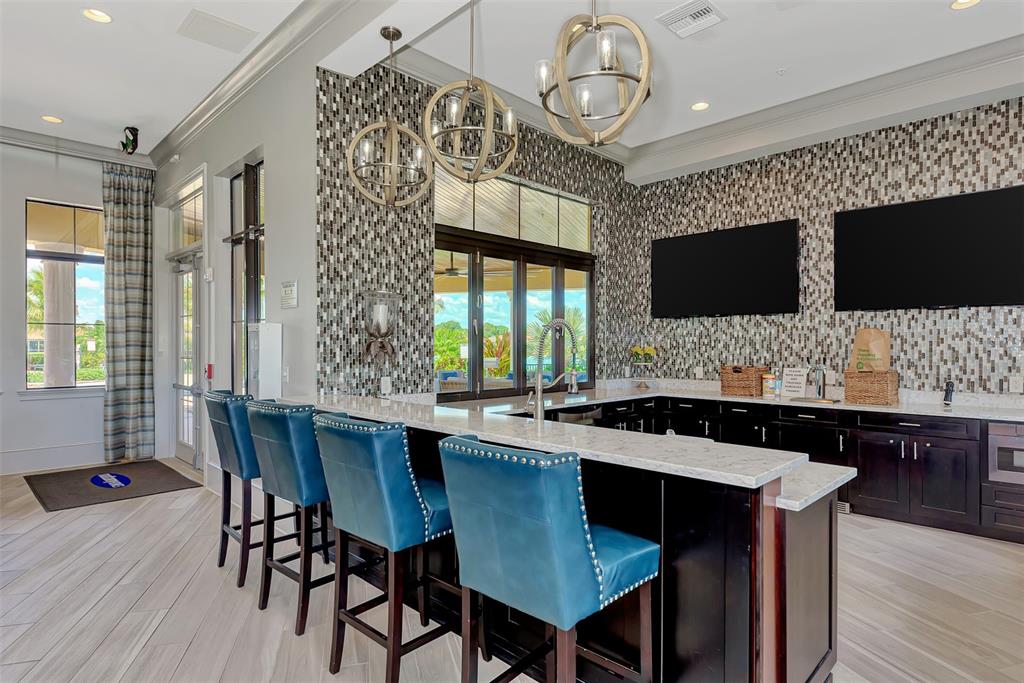 11819 Sistine Lane Venice, FL 34293 - Photo 46 of 90 a dinning table and chairs in the kitchen