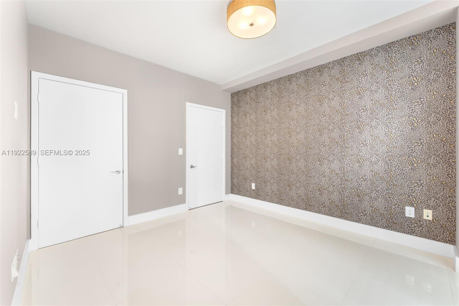 6000 Collins Avenue, Unit 330 Miami Beach, FL 33140 - Photo 12 of 25 a view of an empty room