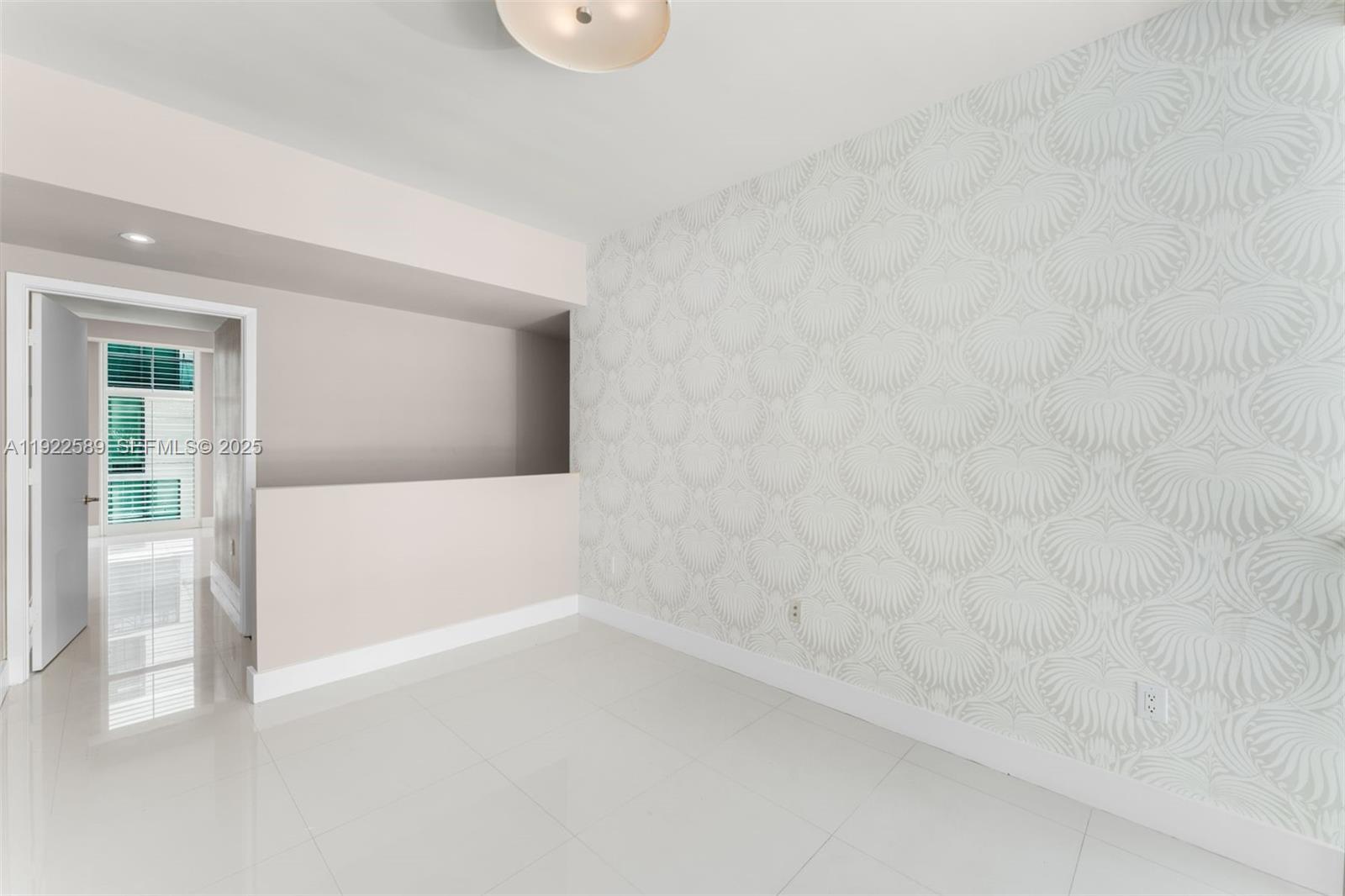 6000 Collins Avenue, Unit 330 Miami Beach, FL 33140 - Photo 17 of 25 a view of an empty room