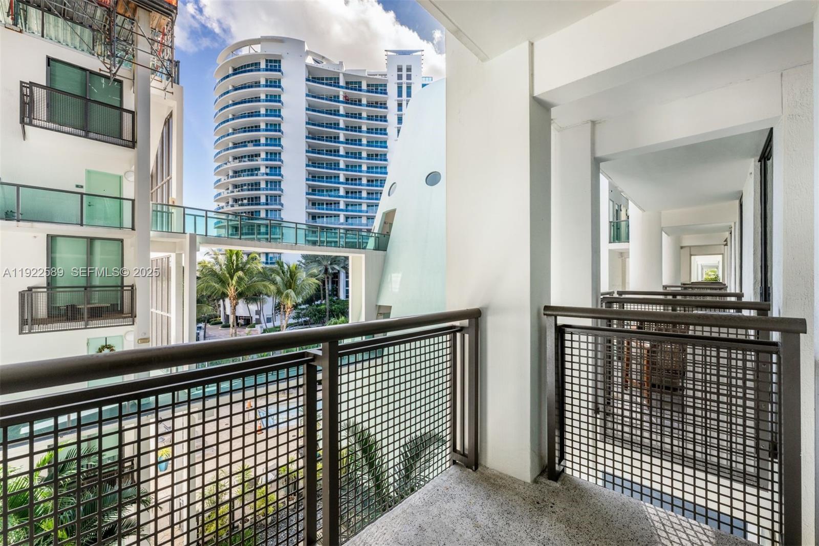 6000 Collins Avenue, Unit 330 Miami Beach, FL 33140 - Photo 24 of 25 a view of balcony with a potted plant