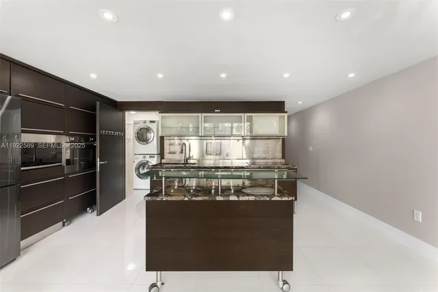 a kitchen with a stove and a refrigerator