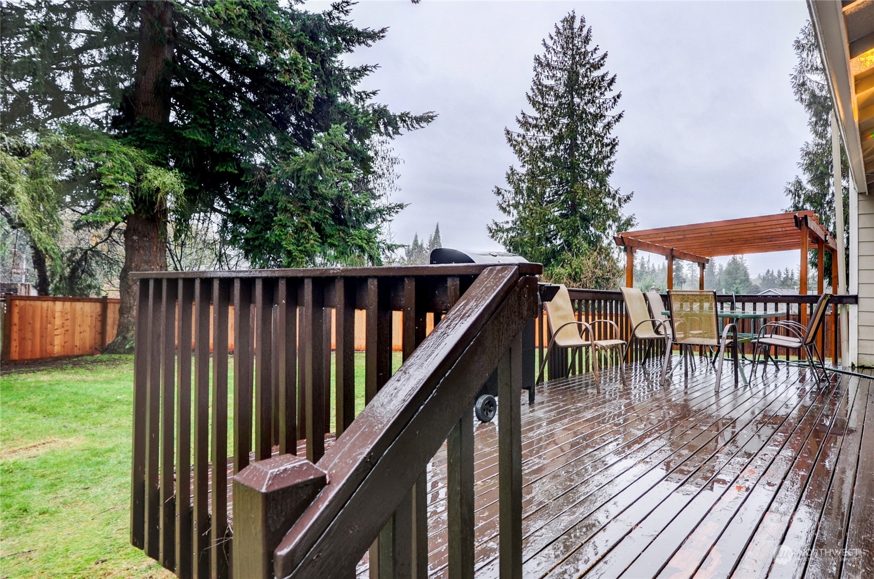 310 216th Street Southwest Bothell, WA 98021 - Photo 26 of 28 a balcony with table and chairs