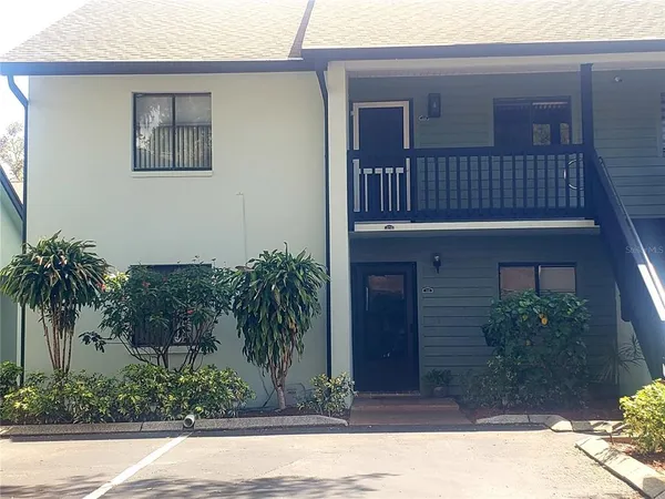 a view of a porch with a bench