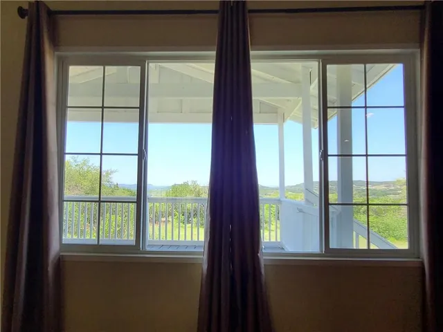 a view of a balcony from window