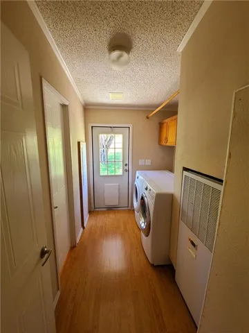 a view of a storage & utility room with washer and dryer