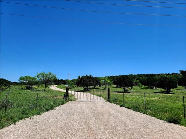 a view of a park with welcome board