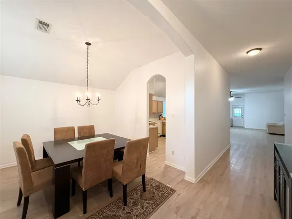 a view of a dining room with furniture