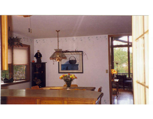 42 Streeter Road Sturbridge, MA 01518 - Photo 5 of 9 a living room with furniture and a fireplace