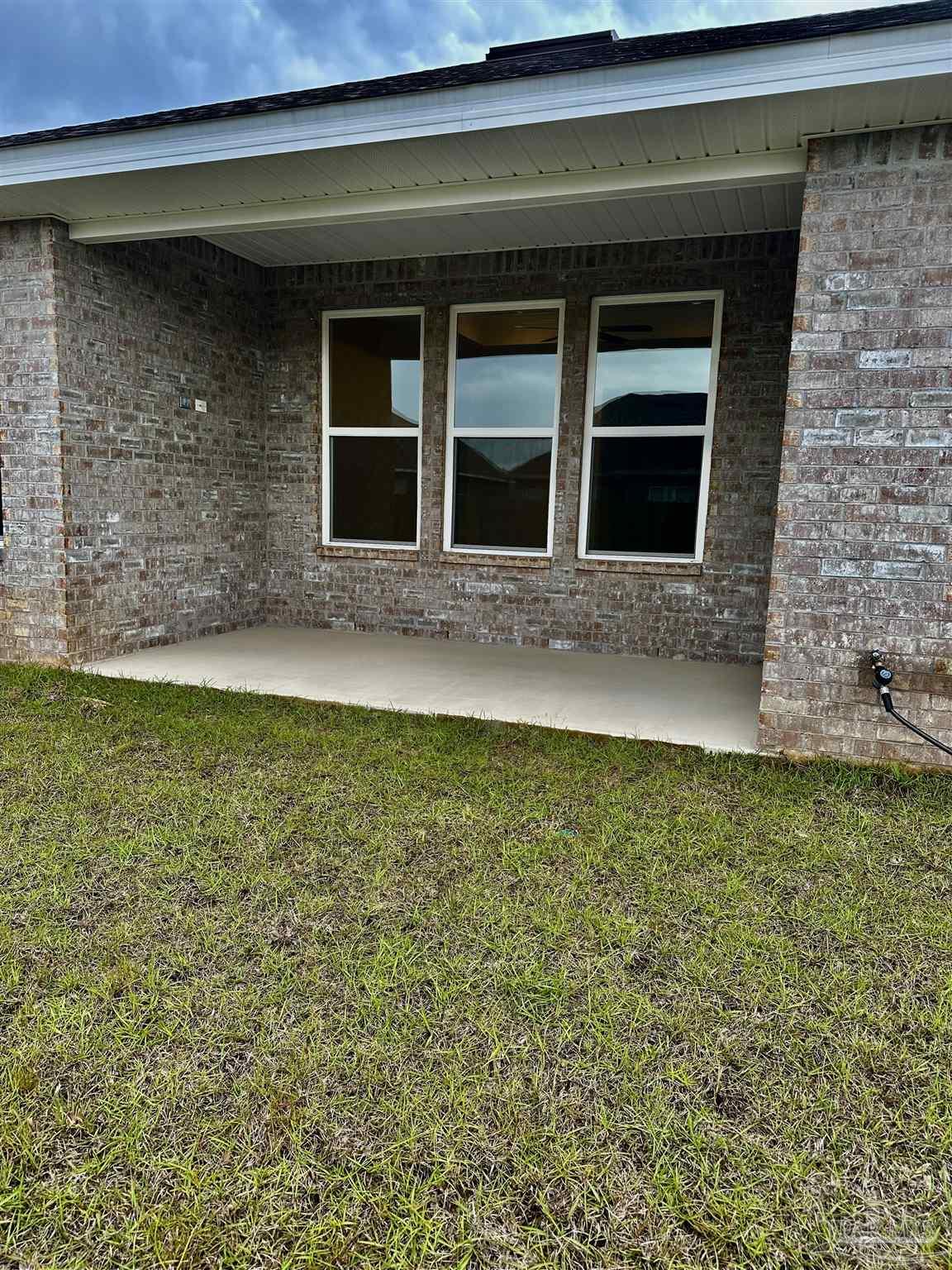 1644 Slate Drive Cantonment, FL 32533 - Photo 26 of 28 a view of house with backyard space