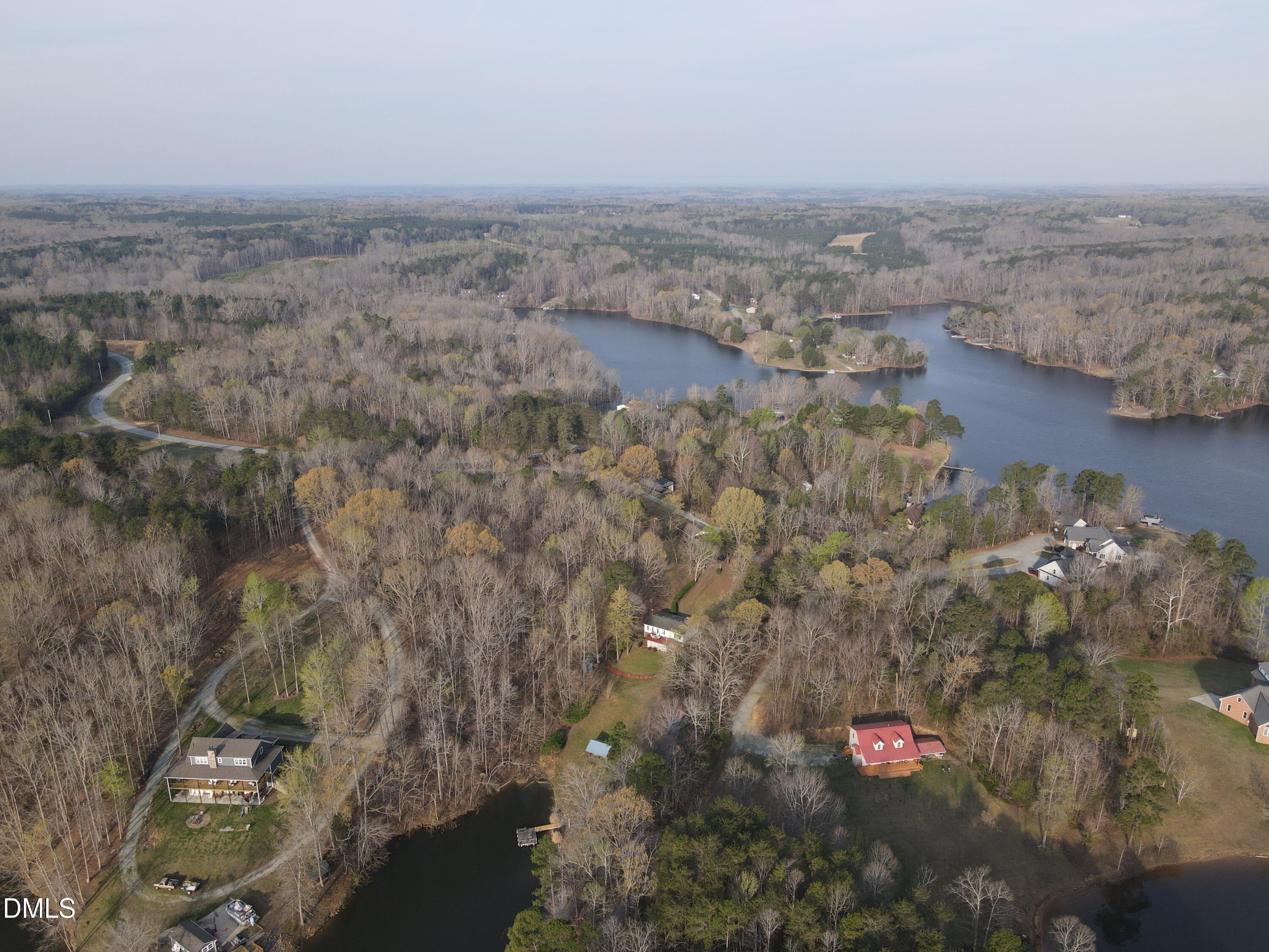130 Lake View Road Prospect Hill, NC 27314 - Photo 14 of 73 an aerial view of house with yard and mountain view in back
