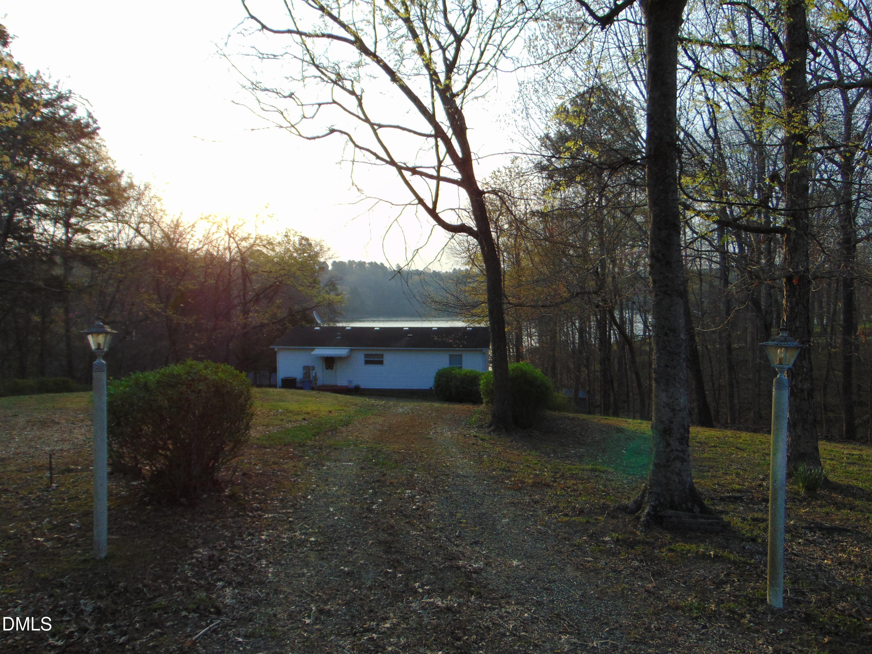 130 Lake View Road Prospect Hill, NC 27314 - Photo 26 of 73 a view of a yard with large trees