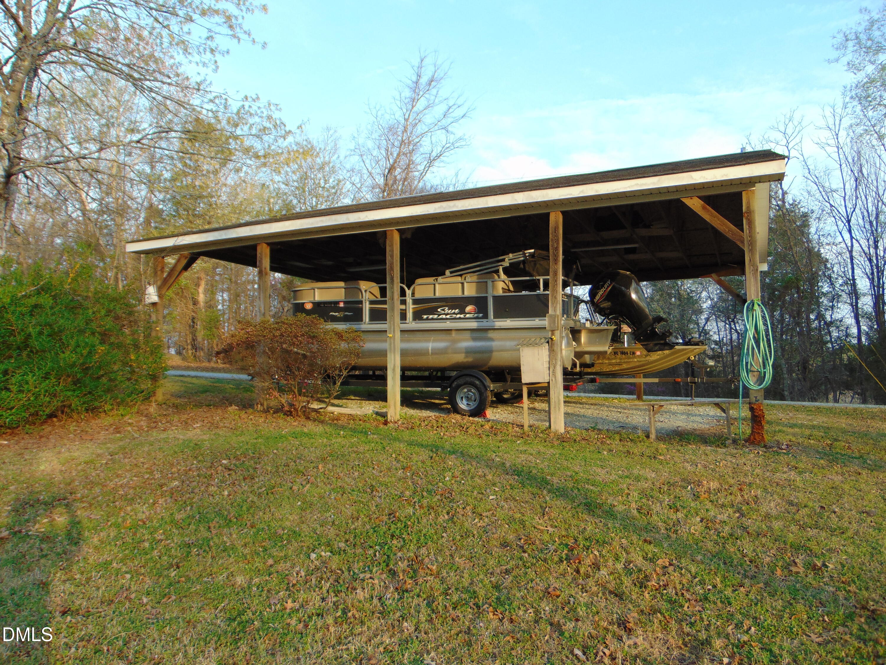 130 Lake View Road Prospect Hill, NC 27314 - Photo 29 of 73 a view of a house with backyard porch and sitting area