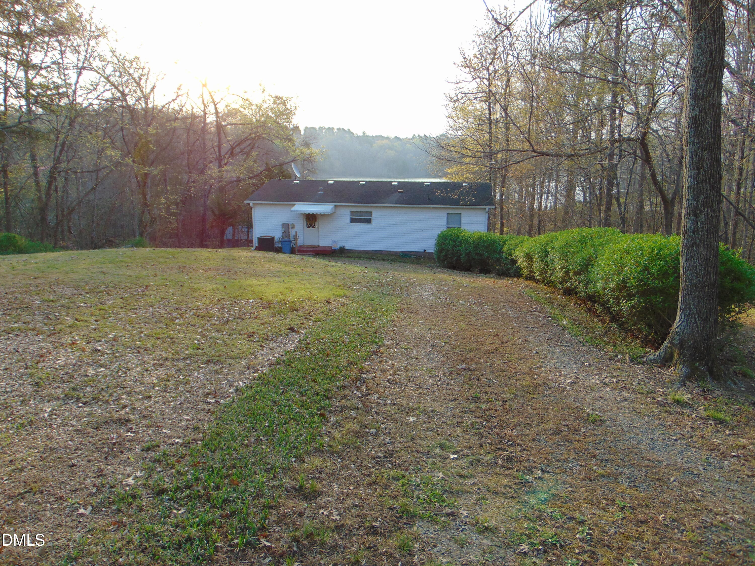130 Lake View Road Prospect Hill, NC 27314 - Photo 33 of 73 a view of a big yard with large trees