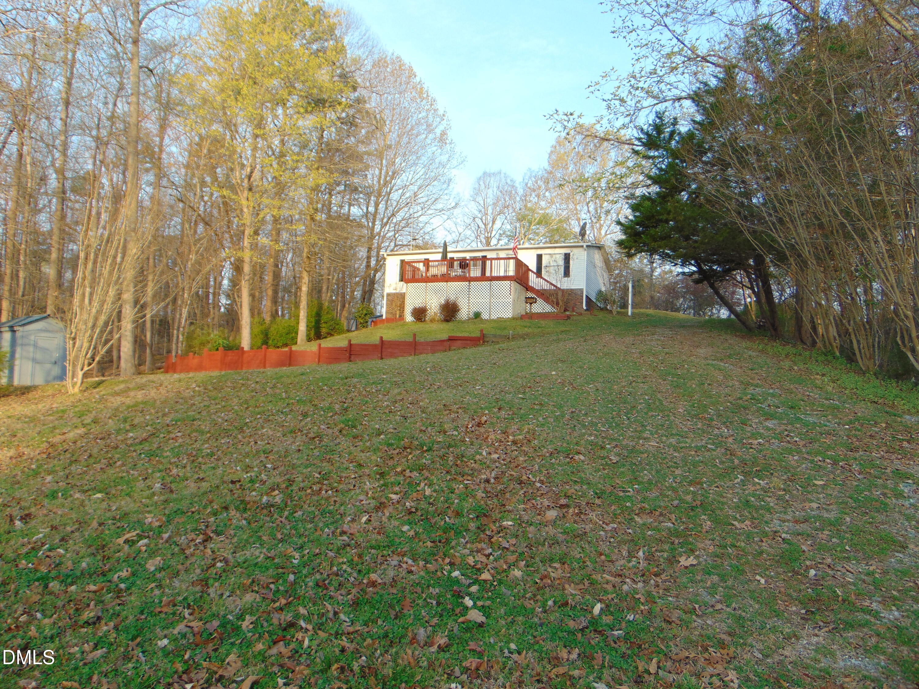 130 Lake View Road Prospect Hill, NC 27314 - Photo 41 of 73 a view of a big yard with large trees