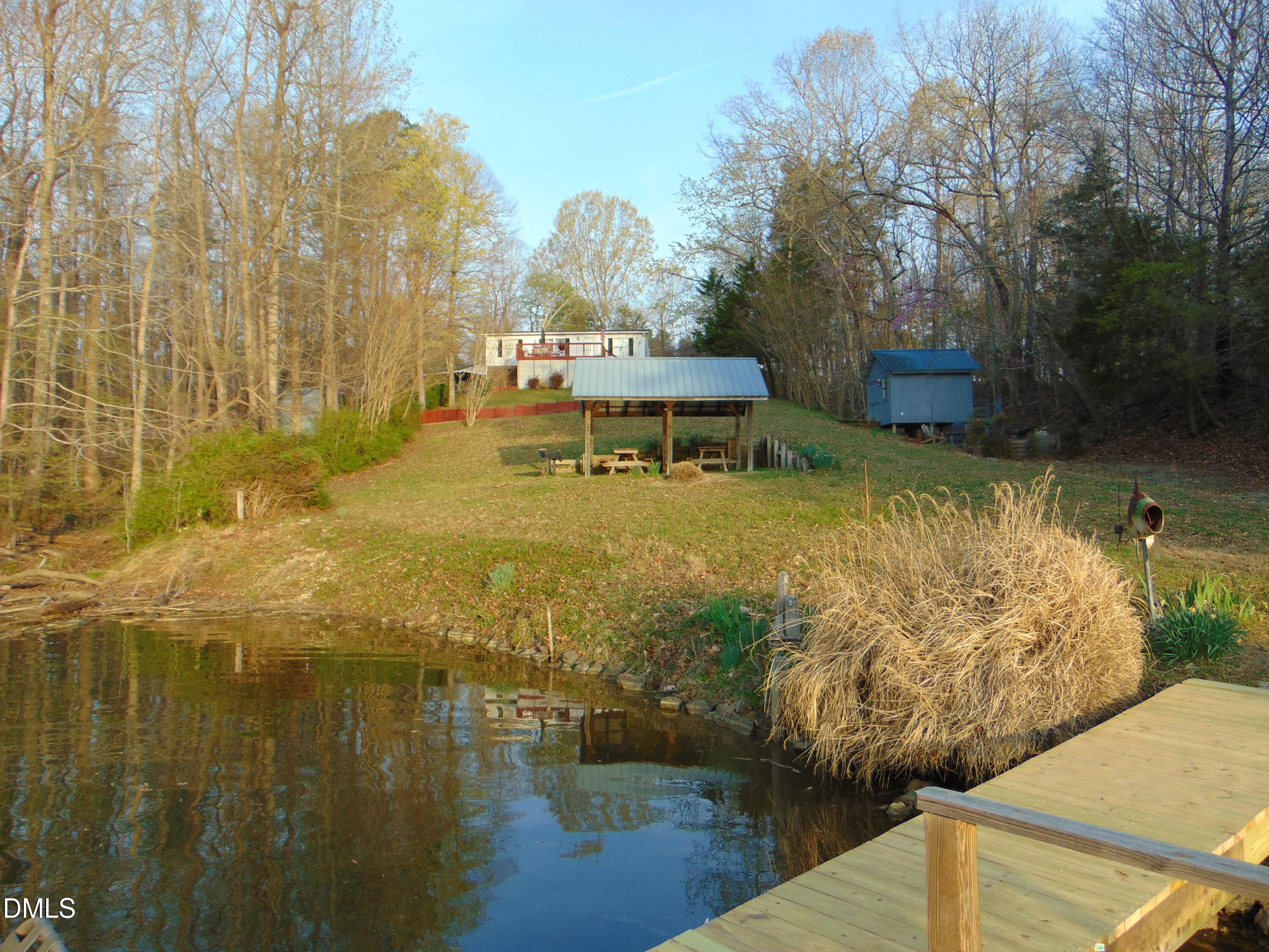 130 Lake View Road Prospect Hill, NC 27314 - Photo 46 of 73 a view of a lake with houses
